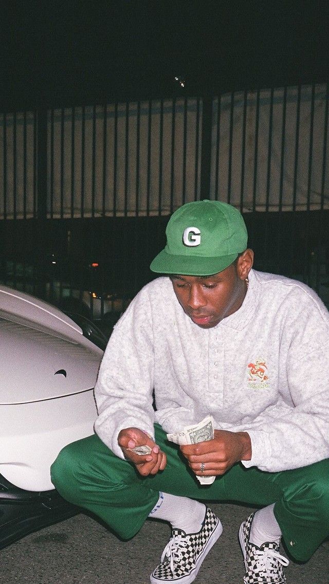 Tyler, the Creator in green shoes